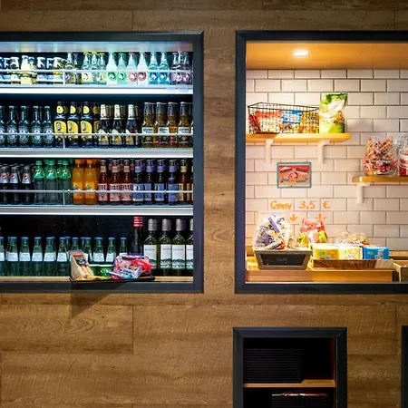 Отель Moxy Frankfurt Airport 4*