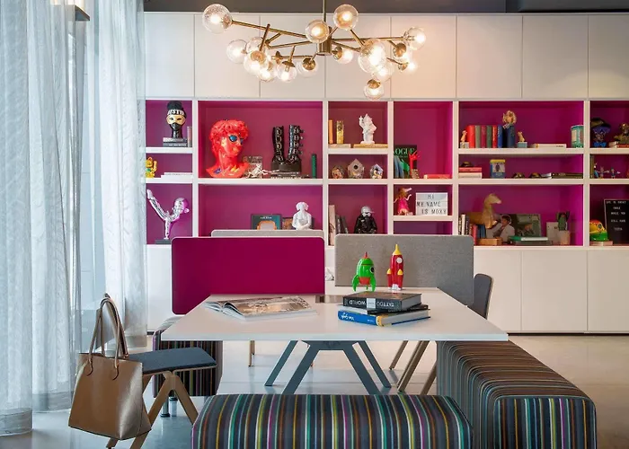 Отель Moxy Frankfurt Airport 4*